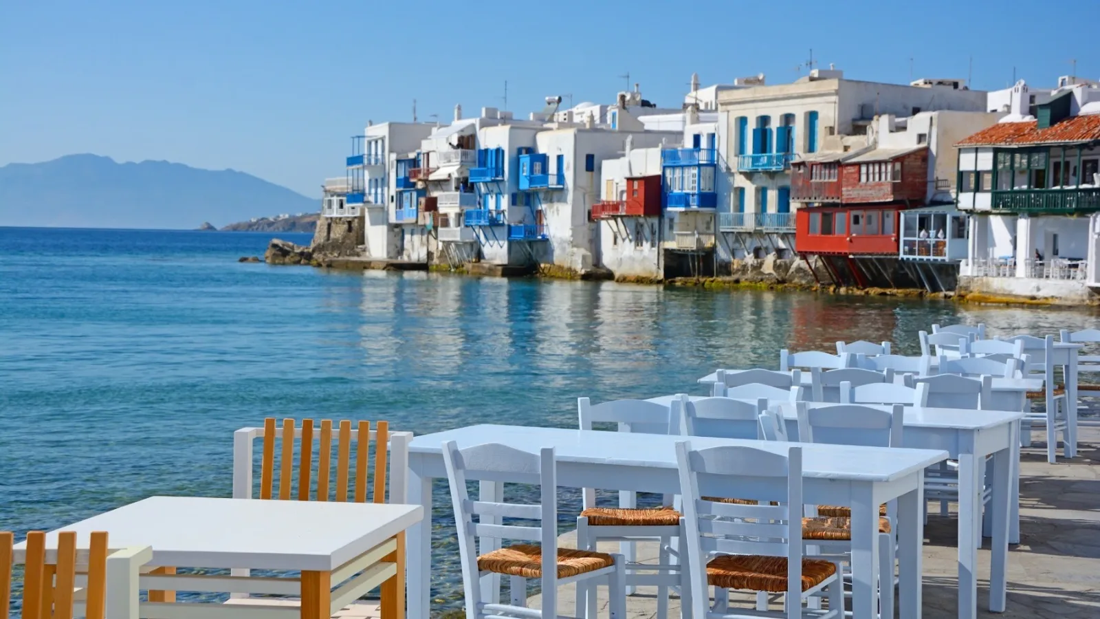 Little Venice Mykonos seafront tables with the sea at your feet