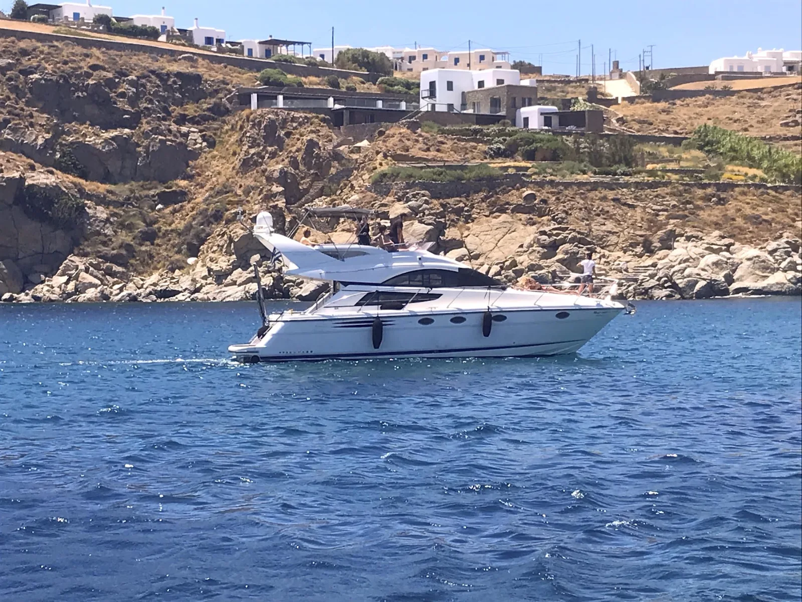 Mykonos yacht charter anchored off Rhenia island